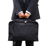 business+man+holding+a+briefcase