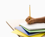 Child+doing+schoolwork.