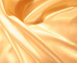 Smooth+elegant+gold+satin+as+background