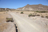 Lonely+road+in+the+desert.+Andalusia%2C+Spain