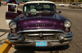 Close-up+of+a+purple+colored+taxi+cab%2C+Havana%2C+Cuba
