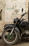 A+motorcycle+with+a+side+car+parked+on+a+street%2C+Havana%2C+Cuba