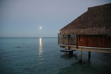 Panoramic+view+of+the+sun+setting+over+the+sea%2C+Moorea%2C+Tahiti%2C+French+Polynesia%2C+South+Pacific