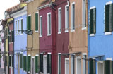 An+array+of+colorful+residential+buildings+in+Venice%2C+Burano%2C+Italy