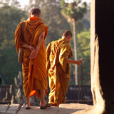 Back+view+of+monks+at+Khmer+Kingdom+palace+ruins