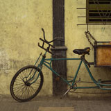 Pedicab+chained+to+a+window+railing%2C+Havana%2C+Cuba