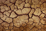 Dry+red+clay+soil+texture%2C+natural+floor+background