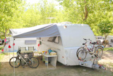 Camping+camper+caravan+trees+park+with+bicycles