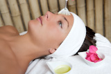 spa+beauty+facial+treatment+oil+brush+and+bouganvillea+flowers