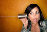 Hispanic+woman+with+tin+can+telephone