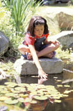 Little+Girl+Playing+in+Pond