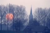 Sun+Setting+Over+Rural+Church