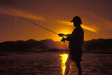 Fishing+on+a+Lake+at+Sunset