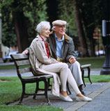 Old+Couple+Sitting+on+Park+Bench+Together