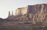 Large+buttes+and+cliff+in+desert