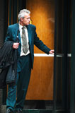 Businessman+in+elevator