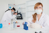 Two female scientists conducting an experiment
