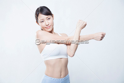 ストレッチする女性 商用利用可能な写真素材 イラスト素材ならストックフォトの定額制ペイレスイメージズ