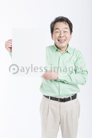 メッセージボードを持つ男性 ストックフォトの定額制ペイレスイメージズ