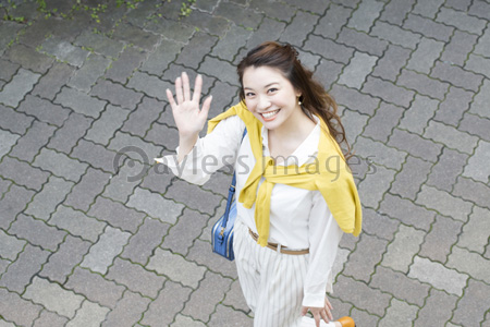 手を振る女性 ストックフォトの定額制ペイレスイメージズ