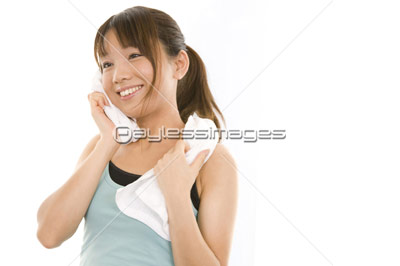汗を拭く女性 ストックフォトの定額制ペイレスイメージズ