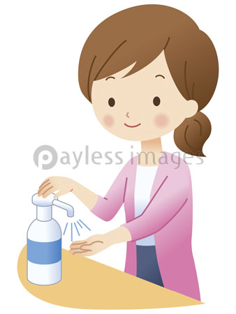 手を消毒する女性