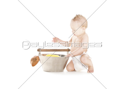 baby boy with wash-tub and scoop