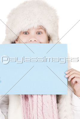 girl in winter hat with blank board