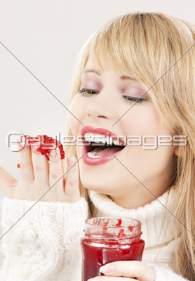 happy teenage girl with raspberry jam
