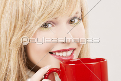 happy teenage girl with red mug