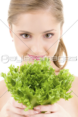 happy woman with lettuce