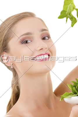 happy woman with spinach