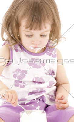 little girl with yogurt