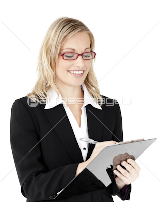 Concentrated businesswoman writing on a clipboard