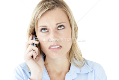 Frustrated businesswoman talking on phone