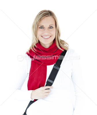 Portrait of a delighted student with scarf smiling at the camera