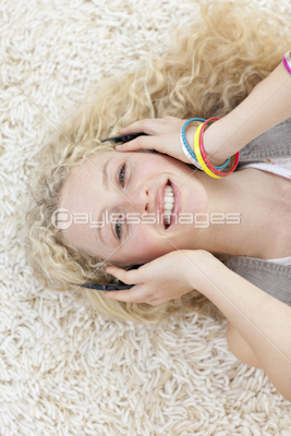 Teen girl listening to music