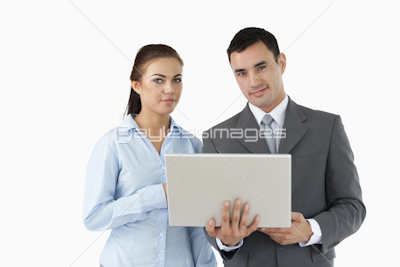 Business partners looking at laptop