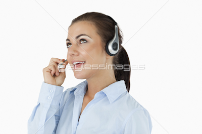 Call center agent looking upwards while talking