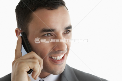 Close up of businessman on the phone looking to the side