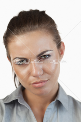 Close up of unhappy businesswoman