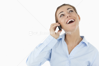 Laughing businesswoman on the phone