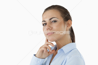 Side view of thinking young businesswoman