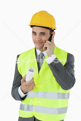 Smiling architect on the phone