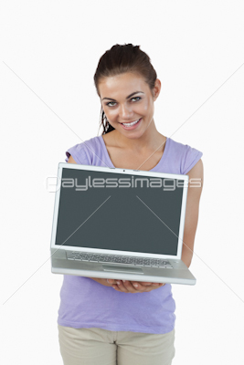 Smiling young female with her laptop