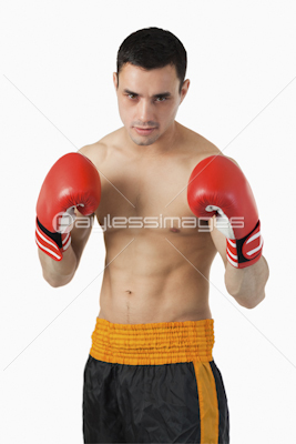 Young boxer in fighting stance
