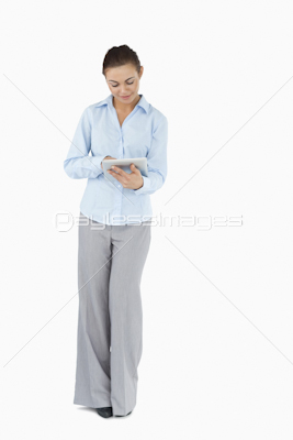Young businesswoman with tablet