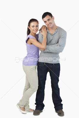 Young couple standing close together