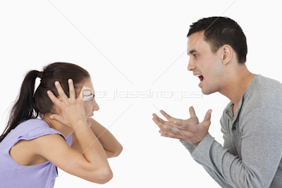 Young couple yelling at each other