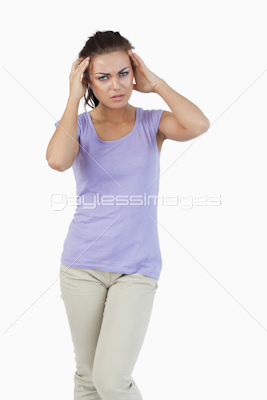 Young female experiencing a headache